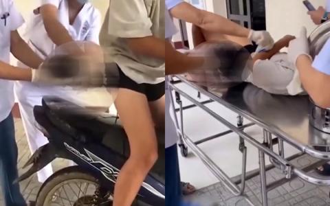 医护人员在医院外接应，将刚在摩托车上出生的男婴和母亲移到担架床。（取自X平台账号NTRL_id）